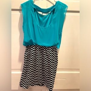 Speechless, light blue chiffon top, black and white fitting mini skirt dress.